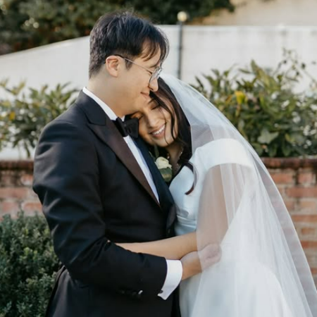 Bini JKrew and her husband on their wedding day. 